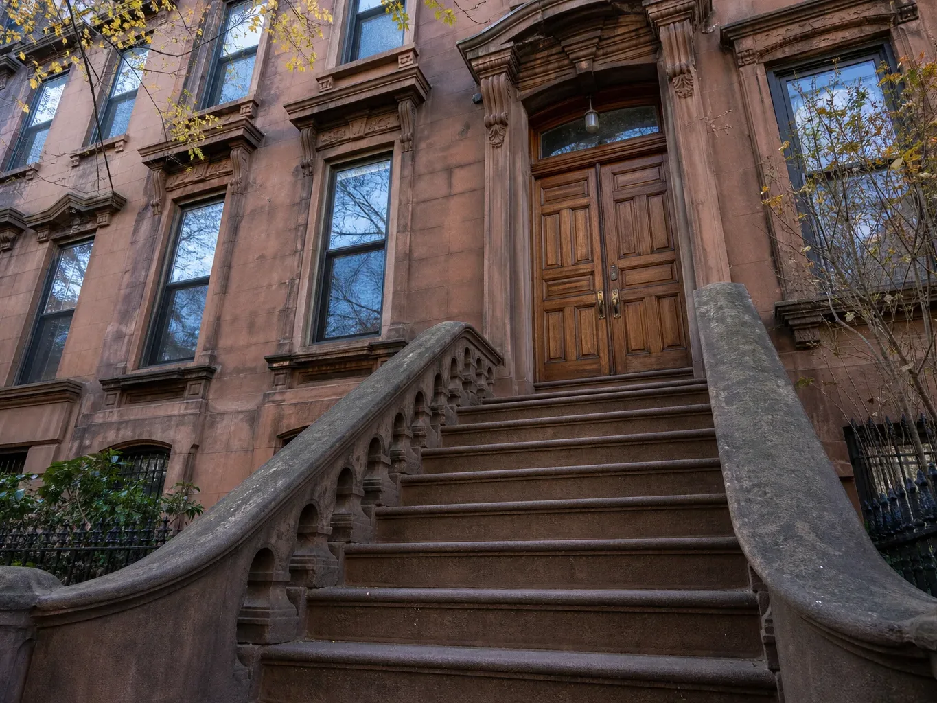A brownstone facade on a Brooklyn residential block